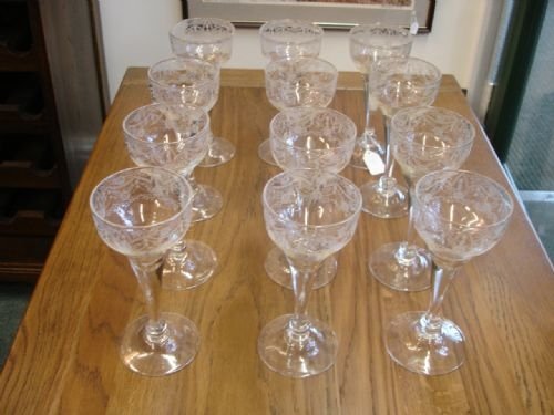 Set of 12 Tall Etched Wine Glasses.