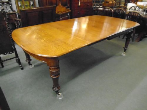 Golden Oak Wind Out Table