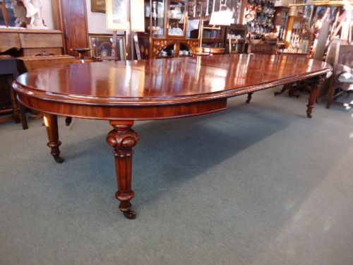 fig 1. Large Round Ended Mahogany Wind Out Dining Table