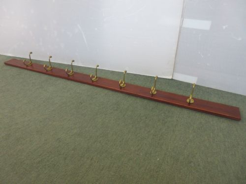 7 Brass Hooks on Mahogany Board
