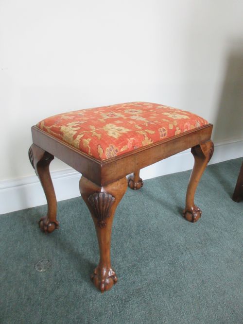 Upholstered Walnut Stool with Ball & Claw Feet.