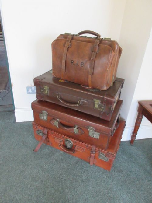 Stack of Three Leather Suit Cases & a Large Size Gladstone Bag, All the Suitcases Are C1900.