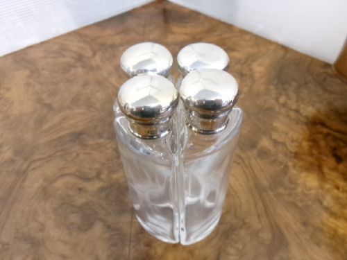 VICTORIAN ROUND LEATHER CASE WITH FOUR SILVER TOP FLASKS - ADDITIONAL PHOTO 5