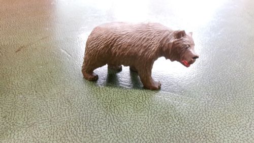 SMALL CARVED BEAR WITH STUD EYES - ADDITIONAL PHOTO 1