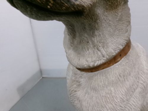 A Victorian painted terracotta figure depicting a seated Jack Russell terrier with grey ears and a brown painted collar. View IV