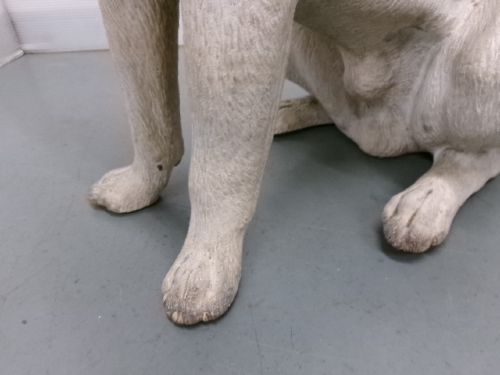A Victorian painted terracotta figure depicting a seated Jack Russell terrier with grey ears and a brown painted collar. View V