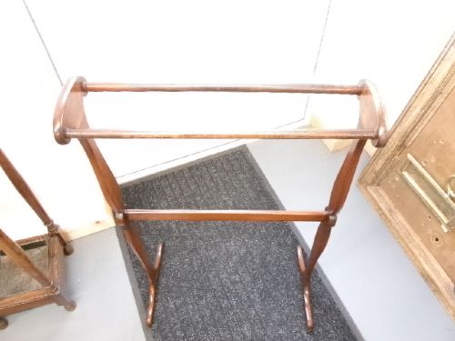 A Victorian mahogany freestanding towel rail featuring double turned crossbars, shaped vertical uprights with scrolled top handles, and splayed feet. View III