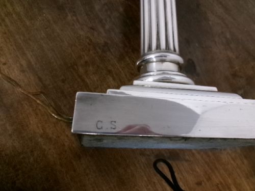 A Victorian silver-plated table lamp shaped as a fluted Corinthian column resting on a stepped square base. View VI