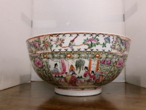 A large round Chinese Canton porcelain punch bowl decorated with hand-painted polychrome enamel panels depicting figures, flowers, and birds. View II