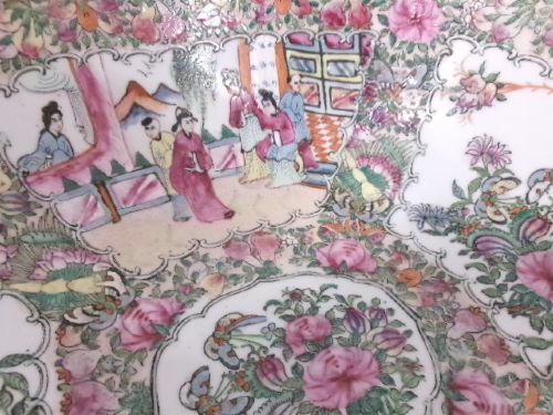 A large round Chinese Canton porcelain punch bowl decorated with hand-painted polychrome enamel panels depicting figures, flowers, and birds. View VI