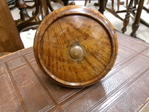 A 19th-century turned treen ceremonial mallet with a heavy rounded base and a decorative carved handle. View IV
