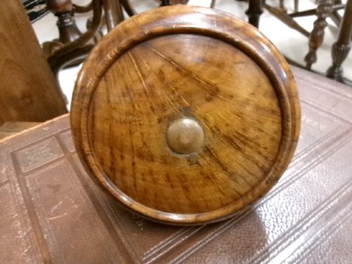 A 19th-century turned treen ceremonial mallet with a heavy rounded base and a decorative carved handle. View V