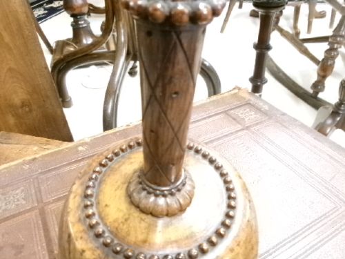 A 19th-century turned treen ceremonial mallet with a heavy rounded base and a decorative carved handle. View X