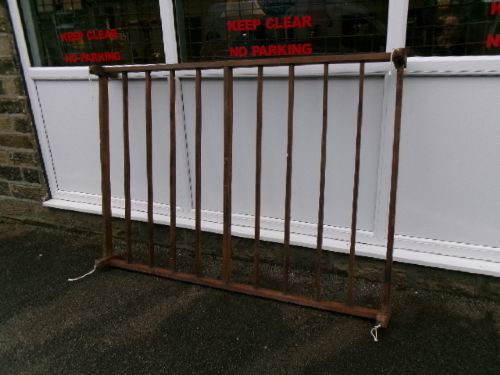 A rectangular 19th-century pine oatcake drying rack featuring slatted timber bars and hanging rope loops. View III