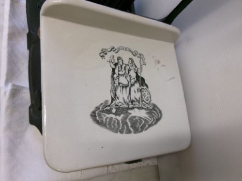 A Victorian cast iron and brass commercial weighing scale featuring a top lion crest, brass pan, and ceramic platform. View III