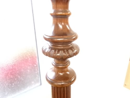 A dark turned mahogany standard lamp with a fluted central column and a moulded circular base. View VII