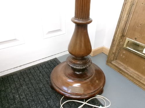 A dark turned mahogany standard lamp with a fluted central column and a moulded circular base. View VIII