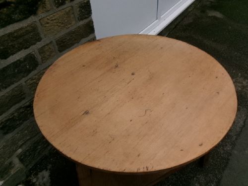 A 19th-century pine cricket table featuring a smooth round top supported by three splayed legs and a triangular undershelf. View IV