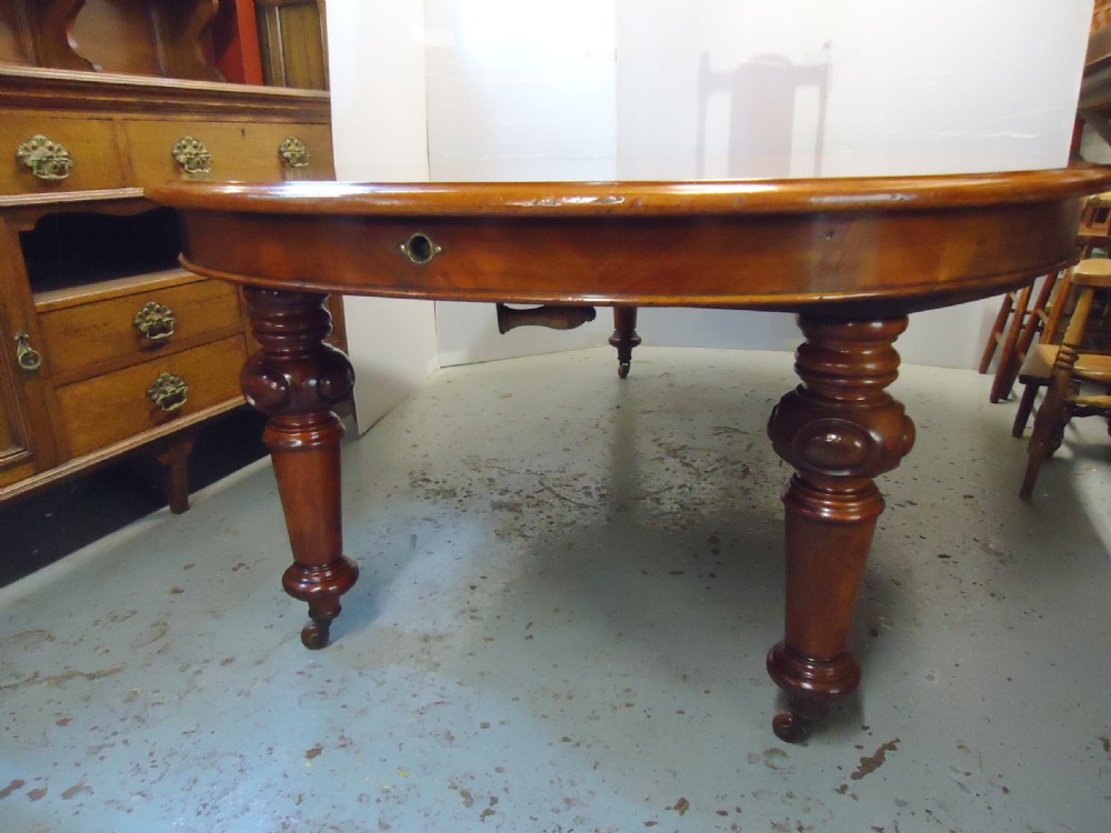 Large Mahogany Wind Out Table View III