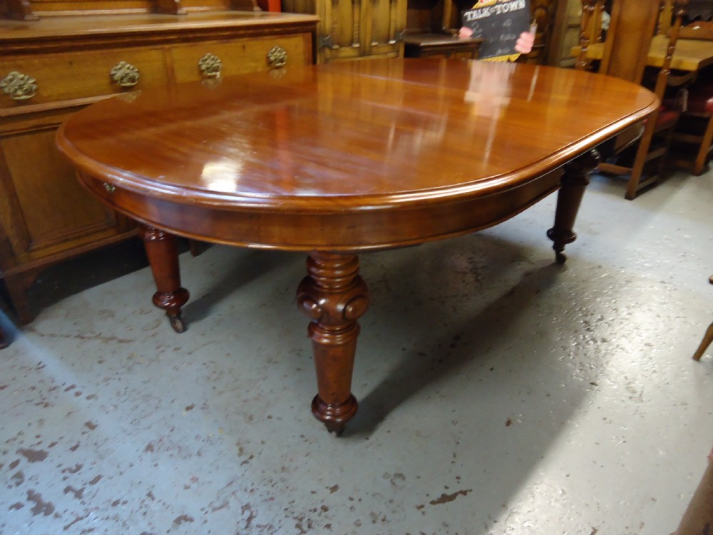 Large Mahogany Wind Out Table View VI