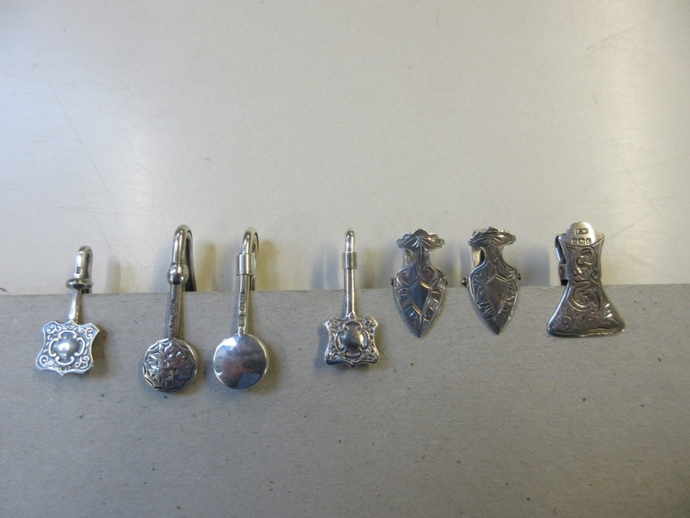 7 Silver Knapkin Clips
