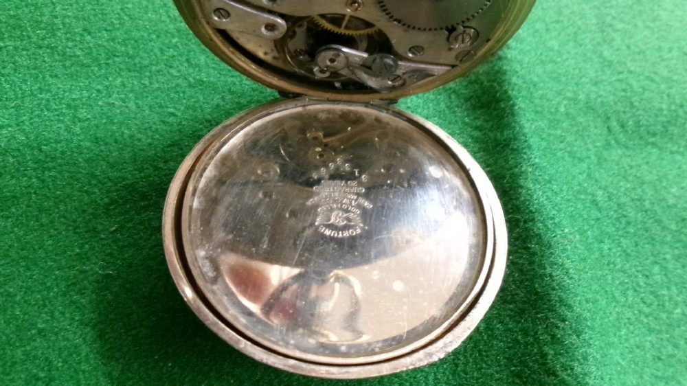 An open gold-plated full hunter pocket watch with a white enamel dial, black Arabic numerals, and a subsidiary seconds dial. View IV