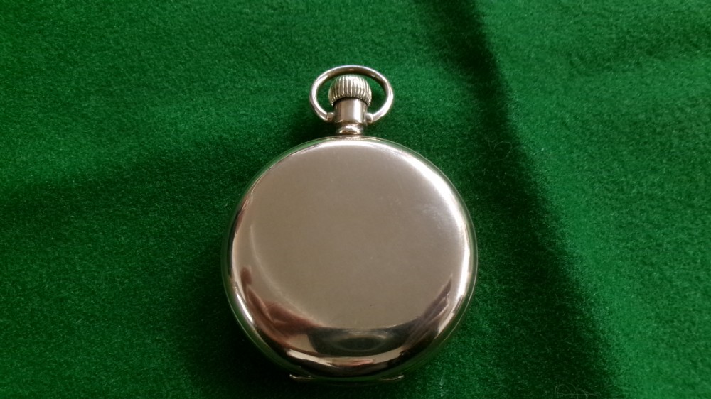 An open gold-plated full hunter pocket watch with a white enamel dial, black Arabic numerals, and a subsidiary seconds dial. View VII