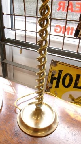 A tall Edwardian brass table lamp featuring an open twist stem and a Tiffany style stained glass dragonfly lampshade. View II