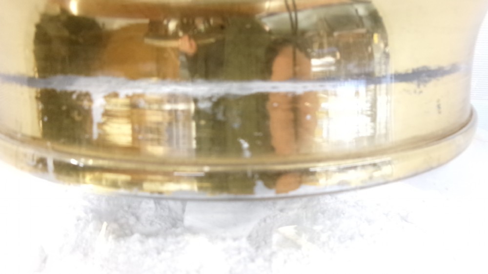 A large clear glass Victorian apothecary jar featuring a gilded coat of arms and arrowroot inscription topped with a fitted domed brass lid. View XV