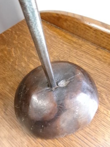 An 18th-century hand-forged wrought iron rushlight holder with an integrated candle socket, mounted on a turned dome fruitwood base. View III
