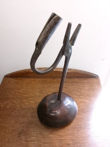 An 18th-century hand-forged wrought iron rushlight holder with an integrated candle socket, mounted on a turned dome fruitwood base. View VIII