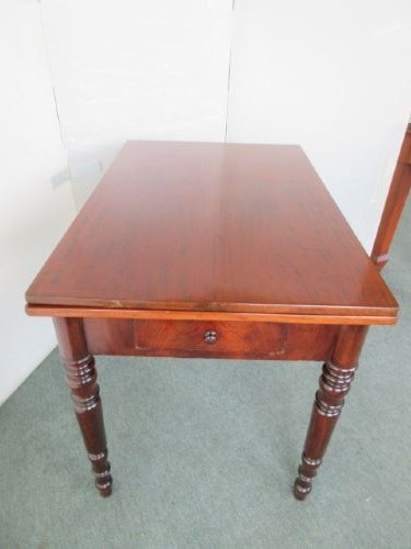 A Victorian mahogany draw leaf dining table with turned legs and a single frieze drawer with a wooden knob. View V
