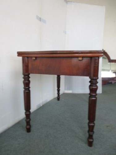 A Victorian mahogany draw leaf dining table with turned legs and a single frieze drawer with a wooden knob. View IX
