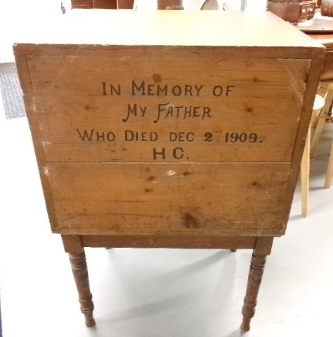 A pine military campaign chest featuring flush recessed brass handles and multiple small drawers. View VI