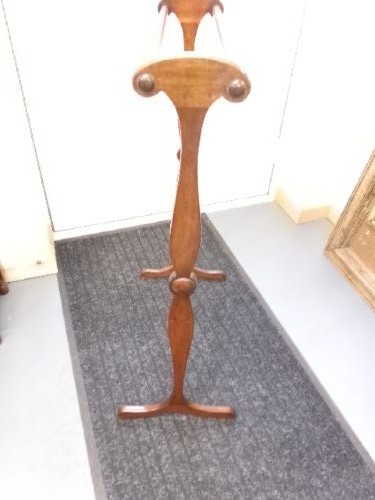 A Victorian mahogany freestanding towel rail featuring double turned crossbars, shaped vertical uprights with scrolled top handles, and splayed feet. View IV
