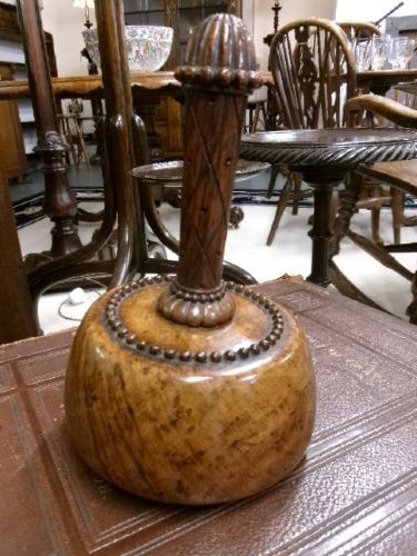 A 19th-century turned treen ceremonial mallet with a heavy rounded base and a decorative carved handle. View VI