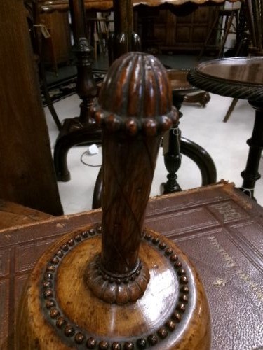A 19th-century turned treen ceremonial mallet with a heavy rounded base and a decorative carved handle. View VII
