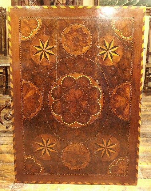 fig 1. A late 17th-century Dutch Baroque side table featuring a geometric parquetry top, spirally turned legs, and a shaped stretcher.