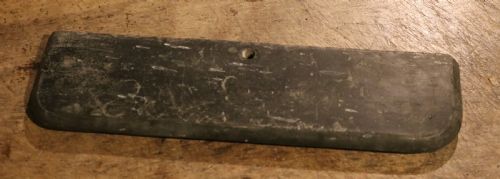 fig 1. A carved nineteenth-century Welsh slate model of a Victorian fire surround featuring corbels, arched panels, and a matching hearth base.