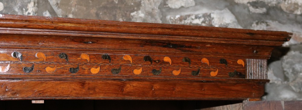 A Georgian Welsh oak secretaire press cupboard featuring upper doors with inlaid oval panels, a drop-front fitted writing section, and three lower drawers with oval brass handles. View III