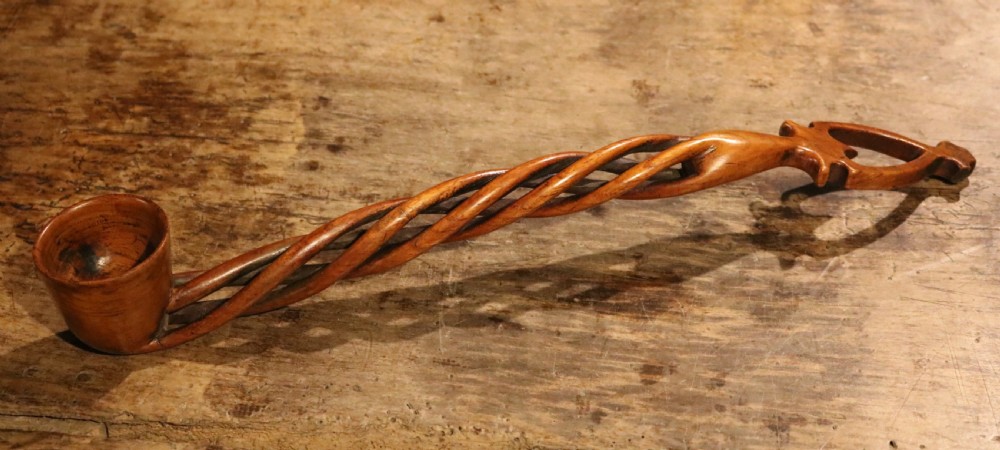 An early nineteenth-century carved Welsh fruitwood lovespoon featuring an openwork spiral stem and a deep bowl. View V