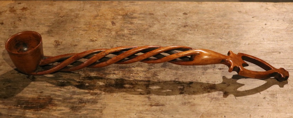 An early nineteenth-century carved Welsh fruitwood lovespoon featuring an openwork spiral stem and a deep bowl. View IX