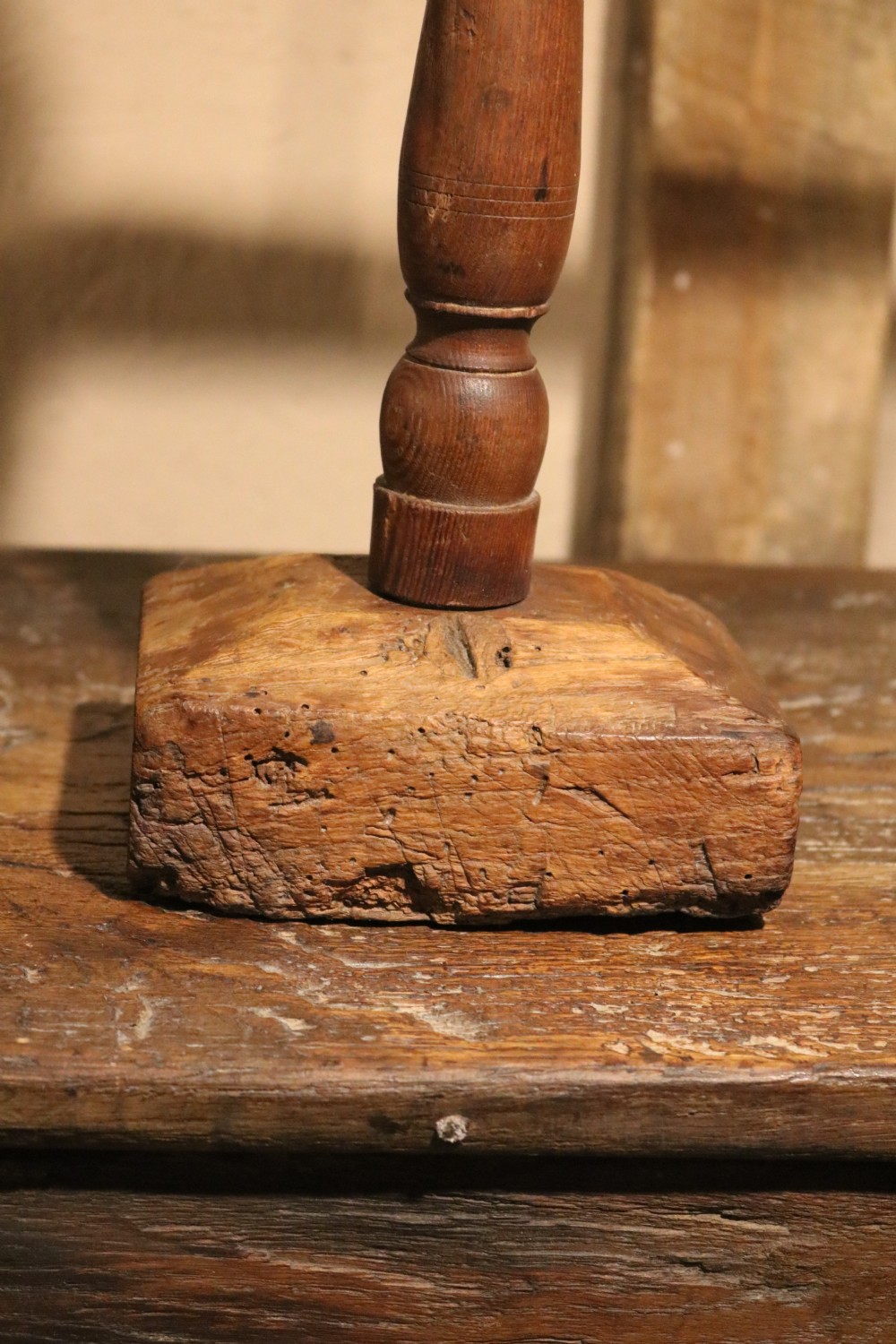 A Georgian turned oak balance scale featuring two wooden square pans suspended by cords from a wooden crossbar. View VI