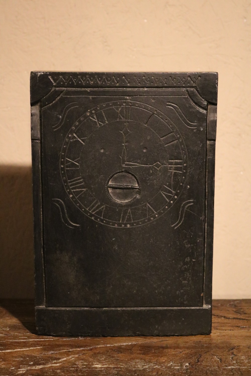 A long rectangular black slate panel featuring a central painted vignette of Caernarfon Castle within a quatrefoil border and faux-marbled side sections. View III