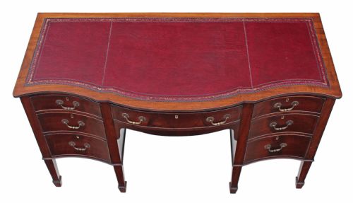 fig 1. Edwardian serpentine mahogany leather desk