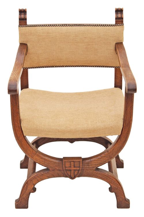 fig 1. Carved oak x-frame desk chair elbow