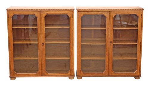 fig 1. Pair of large glazed oak bookcases display cabinets