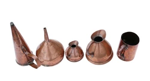 fig 2. 4 Victorian copper measuring jugs and funnel