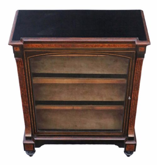 fig 1. Amboyna and ebonised pier display cabinet
