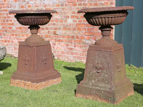 fig 1. Pair of Victorian cast iron planters classical urns on plinths